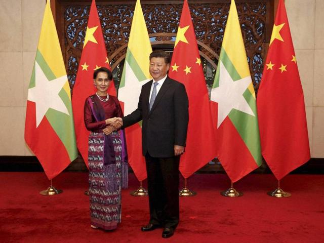 Myanmar's State Counsellor Aung San Suu Kyi shakes hands with Chinese President Xi Jinping before their meeting at Diaoyutai State Guesthouse in Beijing on Friday. (AP) Myanmar's State Counsellor Aung San Suu Kyi shakes hands with Chinese President Xi Jinping before their meeting at Diaoyutai State Guesthouse in Beijing on Friday. (AP)