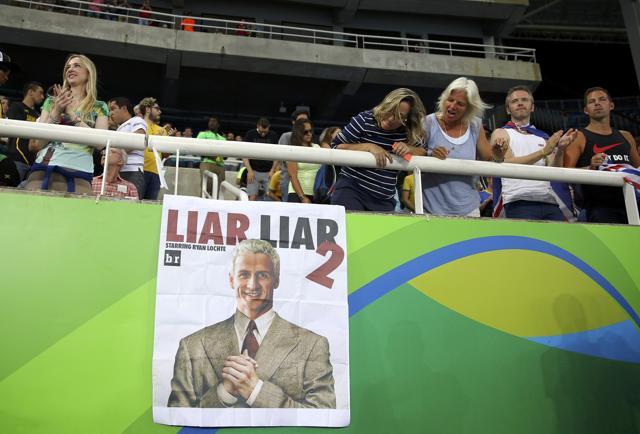 A poster based on the popular movie “Liar Liar” depicting Ryan Lochte as its star is shown during the final of the men’s decathlon javelin throw final in Rio on August 18, 2016. (REUTERS) A poster based on the popular movie “Liar Liar” depicting Ryan Lochte as its star is shown during the final of the men’s decathlon javelin throw final in Rio on August 18, 2016. (REUTERS)