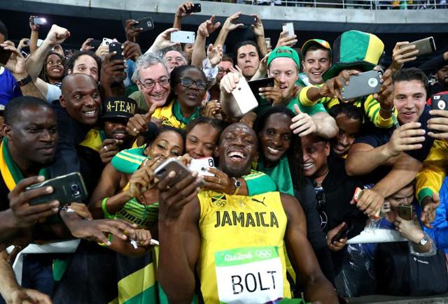 Usain Bolt won the 200 meters to complete the sprint double at a third straight Olympics, but seemed unimpressed with his performance.(Getty Images)