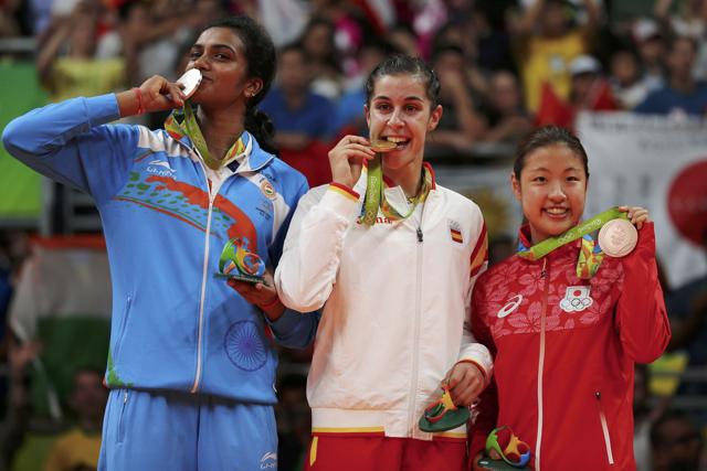 Gold medallist Carolina Marin of Spain, silver medallist PV Sindhu of India and bronze medallist Nozomi Okuhara of Japan pose together. (REUTERS) Gold medallist Carolina Marin of Spain, silver medallist PV Sindhu of India and bronze medallist Nozomi Okuhara of Japan pose together. (REUTERS)
