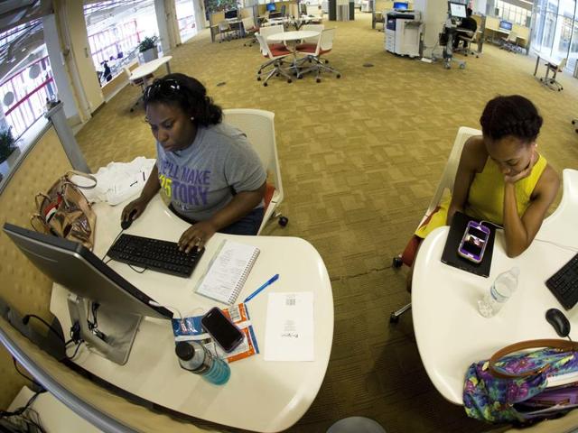 Study desks in the Robert W Woodruff Library in Atlanta. Renovations to the facility include a redesigned main level, upgrades in digital resources, and additional open seating and collaborative study rooms.  (AP) 