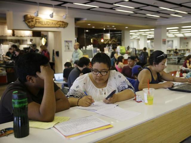Students in the Freudian Sip Cafe inside the newly-renovated Oviatt Library on the Cal State Northridge campus in Los Angeles. The renovations opened a large informal study area on the main floor as well as group study rooms, and a music and media area.  (AP) 