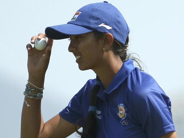 Aditi Ashok of India reacts after a putt on the 18th green during the second round of women's Olympic golf.(AP Photo)
