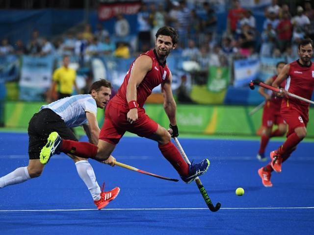 Argentina players celebrate after beating Belgium 4-2 in the men's hockey final in Rio on Thursday.(AP)