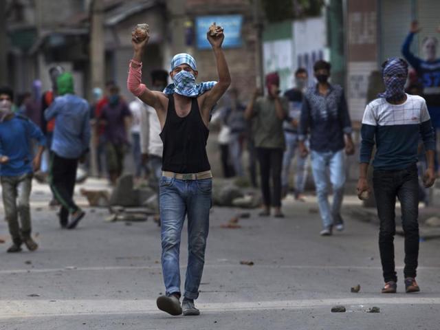 Kashmiris have been clashing with security forces since Hizbul Mujahideen commander Burhan Wani was killed in an encounter in July. Sixty six people have so far died in the violence that has injured hundreds more. (AFP) Kashmiris have been clashing with security forces since Hizbul Mujahideen commander Burhan Wani was killed in an encounter in July. Sixty six people have so far died in the violence that has injured hundreds more. (AFP)