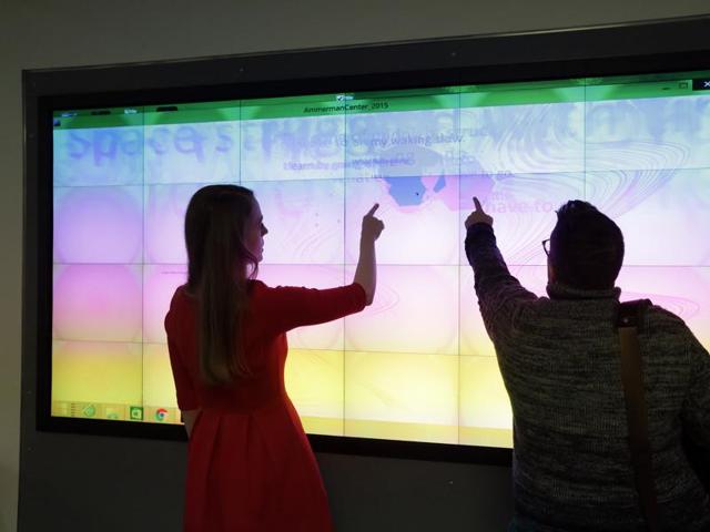 The visualisation wall at the Charles E Shain Library in New London. The library underwent an exterior and interior renovation during the 2014-2015 academic year. The visualisation wall, one of the largest in the Northeast, can be used by computer science students to try out a new video game or by others that need a large interactive screen.  (AP) 
