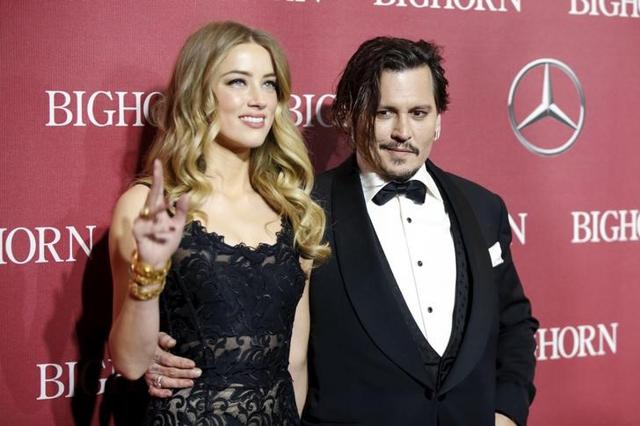 Heard and Depp, 53, privately settled their acrimonious divorce case on Tuesday, a day ahead of a court hearing on the status of a restraining order the actress had obtained against her estranged husband. (Reuters) Heard and Depp, 53, privately settled their acrimonious divorce case on Tuesday, a day ahead of a court hearing on the status of a restraining order the actress had obtained against her estranged husband. (Reuters)