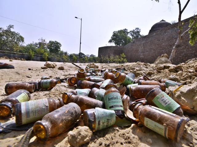 Empty bottles of Amwil solution used by drug addicts in old Delhi. (Arun Sharma/ Hindustan Times) Empty bottles of Amwil solution used by drug addicts in old Delhi. (Arun Sharma/ Hindustan Times)