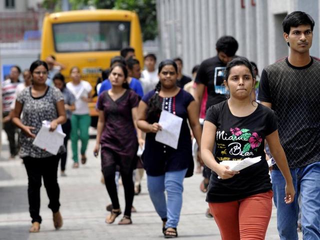 Applicants stepping out of the examination centre in Noida after appearing for NEET 2  exam on Sunday, July 24, 2016. (Sunil Ghosh / HT file)