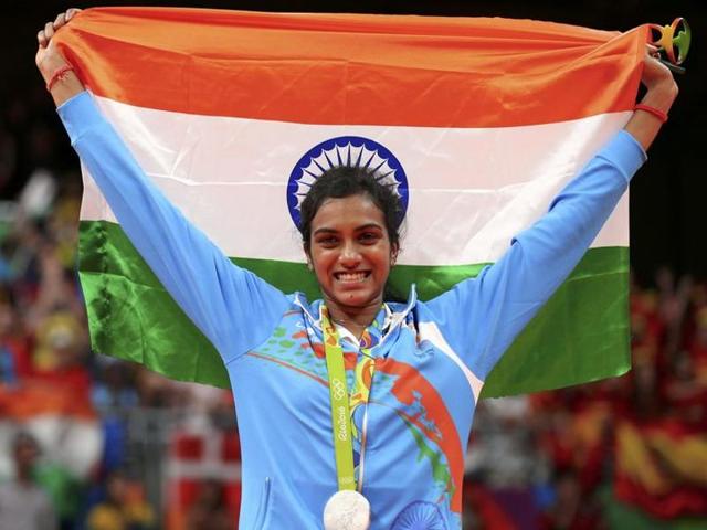 P.V. Sindhu with the silver medal she won for badminton women’s singles at the Rio Olympics.(AP)