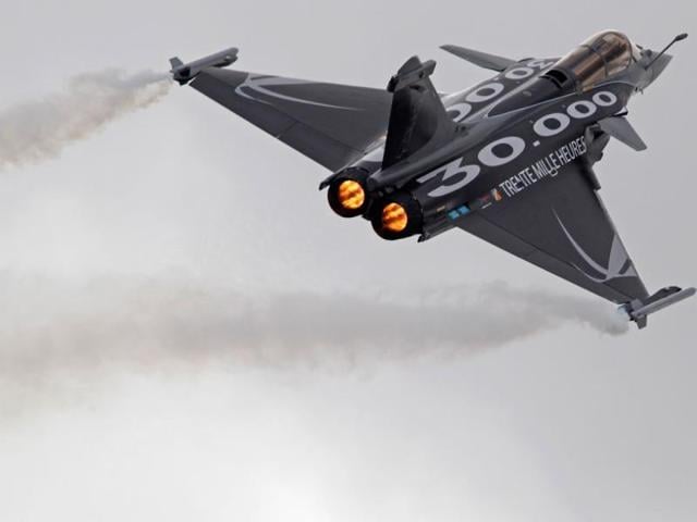 In this file photo, a Dassault Rafale fighter jet takes part in a flying display during the 49th Paris Air Show. In this file photo, a Dassault Rafale fighter jet takes part in a flying display during the 49th Paris Air Show.