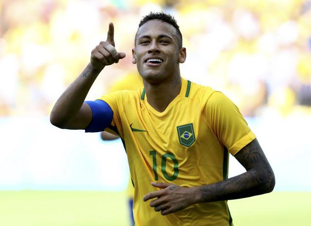 Neymar of Brazil celebrates after scoring a penalty goal against Honduras. (REUTERS) Neymar of Brazil celebrates after scoring a penalty goal against Honduras. (REUTERS)