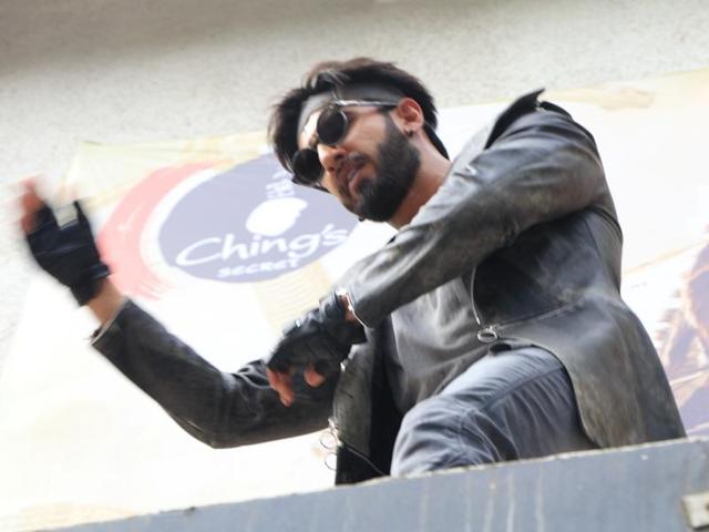 Ranveer Ching (oh, we mean Singh) does a jig next to the billboard of his ad film in Mumbai. (IANS) Ranveer Ching (oh, we mean Singh) does a jig next to the billboard of his ad film in Mumbai. (IANS)