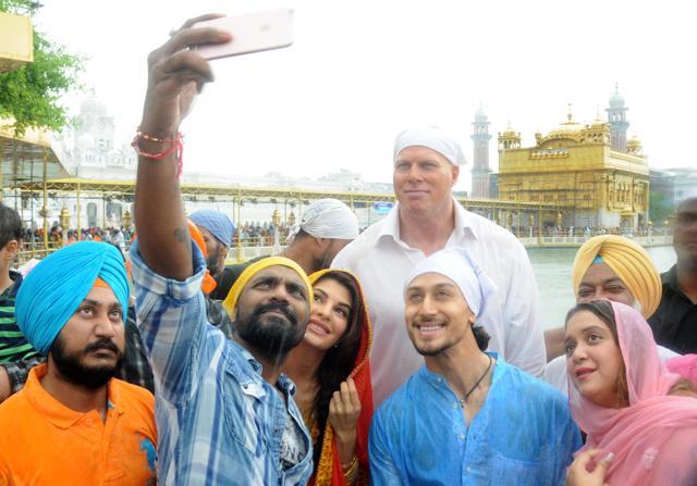 Director Remo D’Souza taking a selfie with Jacqueline Fernandez, Tiger Shroff and others at the Golden Temple. (Sameer Sehgal/HT Photo) Director Remo D’Souza taking a selfie with Jacqueline Fernandez, Tiger Shroff and others at the Golden Temple. (Sameer Sehgal/HT Photo)