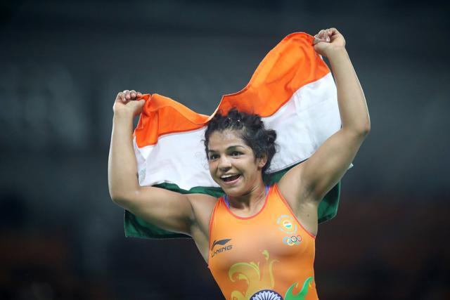Sakshi Malik of India celebrates after defeating Aisuluu Tynybekova of Kyrgyzstan. (Corbis via Getty Images) Sakshi Malik of India celebrates after defeating Aisuluu Tynybekova of Kyrgyzstan. (Corbis via Getty Images)