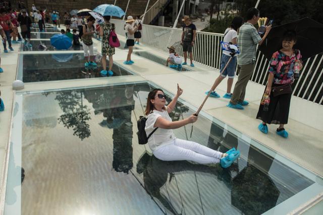 Selfie’s on the bridge connecting a valley in China's Zhangjiajie will be banned, presumably to avoid accidents. (AFP) Selfie’s on the bridge connecting a valley in China's Zhangjiajie will be banned, presumably to avoid accidents. (AFP)