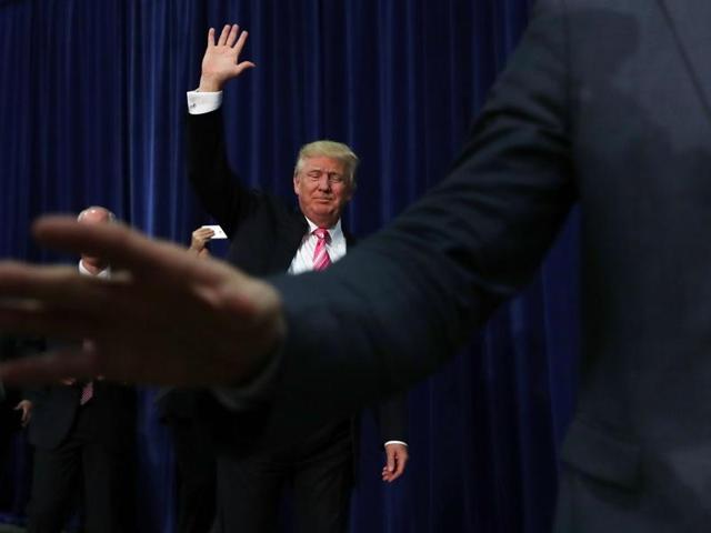 Republican presidential nominee Donald Trump arrives for a campaign event at Fredericksburg Expo Center on Saturday. (AFP) Republican presidential nominee Donald Trump arrives for a campaign event at Fredericksburg Expo Center on Saturday. (AFP)