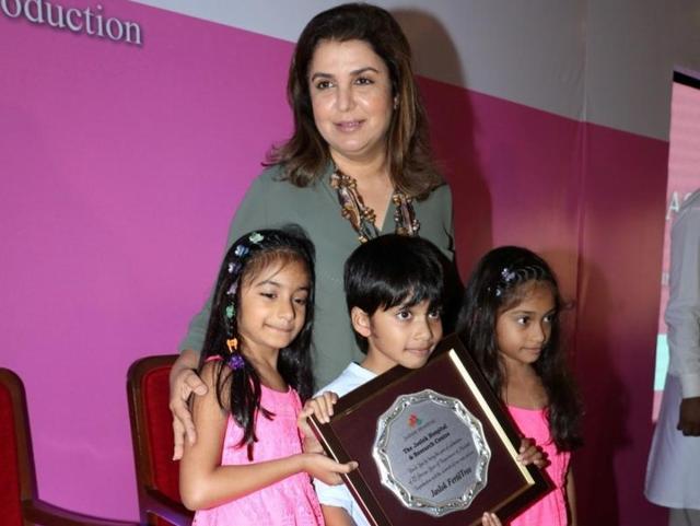 Filmmaker Farah Khan with her children at an event in Mumbai on August 15, 2016. (IANS)