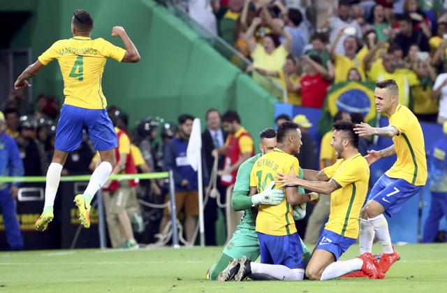 Brazil players celebrate their gold medal win. (REUTERS) Brazil players celebrate their gold medal win. (REUTERS)