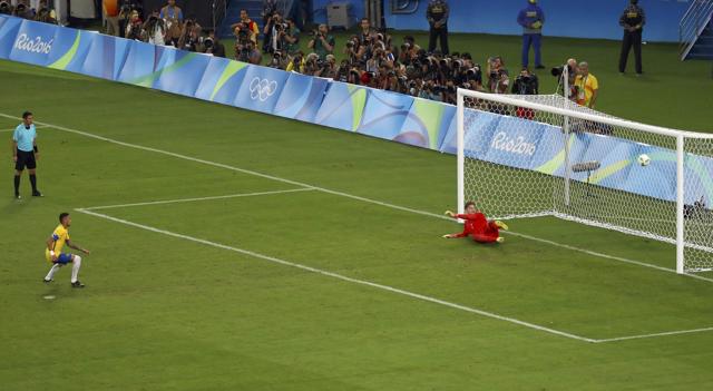 The Barcelona superstar slotted home the decisive penalty to win the only medal missing in Brazil’s illustrious football history. (REUTERS)
