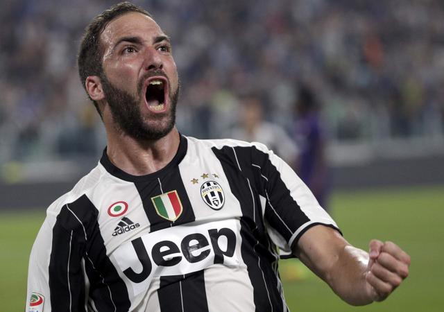 Juventus' Gonzalo Higuain, introduced moments before Fiorentina’s equaliser, got on the end of a ricochet and swept it in from close range to delight a packed home crowd.(REUTERS)