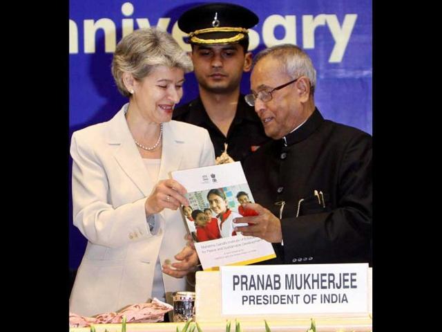 Director General of Unesco, Irina Bokova, presents a brochure to President Pranab Mukherjee during a function to celebrate World Education Day 2012 in New Delhi. (PTI File Photo ) Director General of Unesco, Irina Bokova, presents a brochure to President Pranab Mukherjee during a function to celebrate World Education Day 2012 in New Delhi. (PTI File Photo )