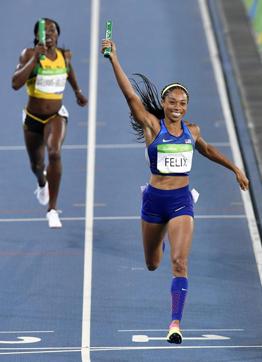 United States' Allyson Felix crosses the line to win the gold medal in the women's 4x400-meter relay final. (AP) United States' Allyson Felix crosses the line to win the gold medal in the women's 4x400-meter relay final. (AP)