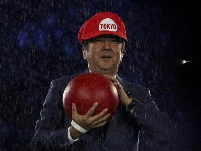 Japanese Prime Minister Shinzo Abe, present at the ceremony for the official passing of the Olympic flag from Brazil to Japan., dressed as Super Mario. (REUTERS)