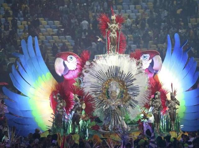 Performers on a giant carnival float. (Reuters)
