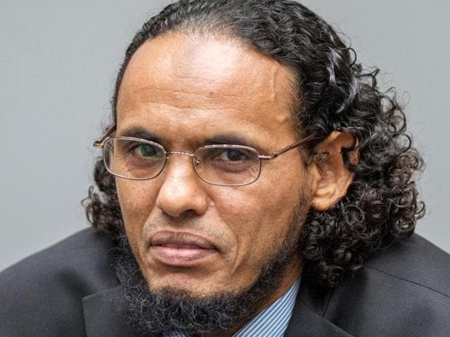 Ahmad al-Faqi al-Mahdi appears at the International Criminal Court in The Hague, Netherlands at the start of his trial on charges of involvement in the destruction of historic mausoleums in Timbuktu during Mali's 2012 conflict.(Reuters)