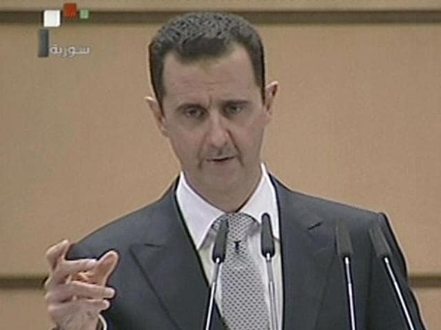This videograb from Syrian state television shows Syrian President Bashar al-Assad delivering a speech in Damascus. (AFP File Photo) This videograb from Syrian state television shows Syrian President Bashar al-Assad delivering a speech in Damascus. (AFP File Photo)