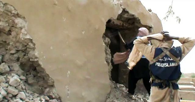 This video grab shows Islamist militants destroying an ancient shrine in Timbuktu. (AFP File Photo)