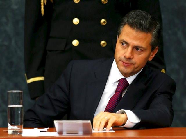 Mexico's President Enrique Pena Nieto gestures during an investment announcement from brewer Grupo Modelo at Los Pinos Presidential house in Mexico City. (Reuters) Mexico's President Enrique Pena Nieto gestures during an investment announcement from brewer Grupo Modelo at Los Pinos Presidential house in Mexico City. (Reuters)