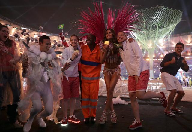 Athletes pose for photos during the closing ceremony in the Maracana stadium at the 2016 Summer Olympics in Rio de Janeiro on Sunday. (AP)