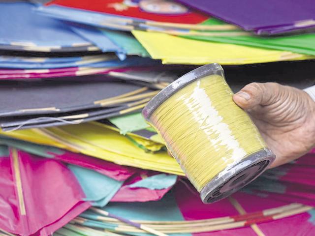 Chinese kite string (manjha) sale in Lal Kuan market, Old Delhi, on Tuesday.(Sanjeev Verma/Hindustan Times)