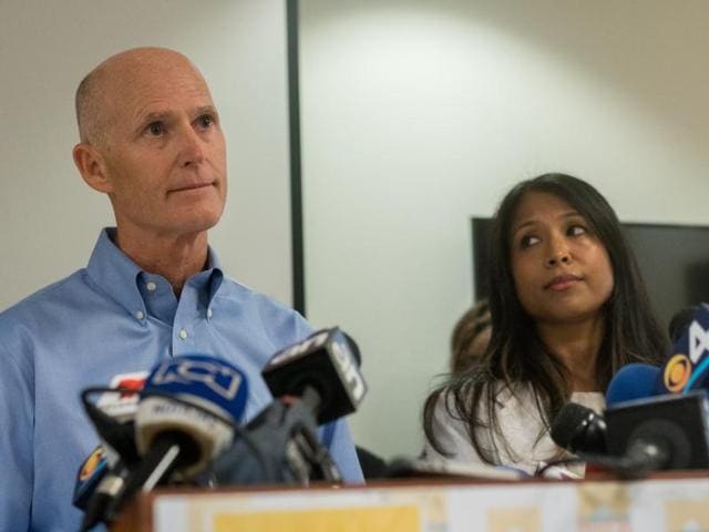 Florida governor Rick Scott and surgeon general Dr Celeste Philip address the media as they announce five cases of Zika in a 1.5 mile area of Miami Beach.(AFP) Florida governor Rick Scott and surgeon general Dr Celeste Philip address the media as they announce five cases of Zika in a 1.5 mile area of Miami Beach.(AFP)