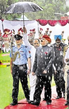 New Punjab governor VP Singh Badnore walking towards the dignitaries after taking oath, in the downpour at Punjab Raj Bhawan in Chandigarh on Monday. (Keshav Singh/HT Photo) New Punjab governor VP Singh Badnore walking towards the dignitaries after taking oath, in the downpour at Punjab Raj Bhawan in Chandigarh on Monday. (Keshav Singh/HT Photo)