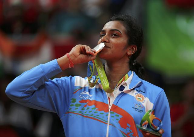 PV Sindhu after winning silver in Olympics for women’s singles in badminton.(REUTERS) PV Sindhu after winning silver in Olympics for women’s singles in badminton.(REUTERS)
