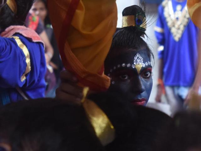 A college student dressed as Lord Krishna during a cultural event in the run up to the ‘Dahi-Handi’ (curd pot) ritual of the Janmashtami festival, at SNDT College, Matunga, Mumbai.  (Kunal Patil/HT PHOTO) 