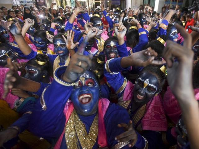 College students dressed as Lord Krishna during a cultural event in the run up to the ‘Dahi-Handi’ (curd pot) ritual of the Janmashtami festival, at SNDT College, Matunga, Mumbai.   (Kunal Patil/HT PHOTO) 