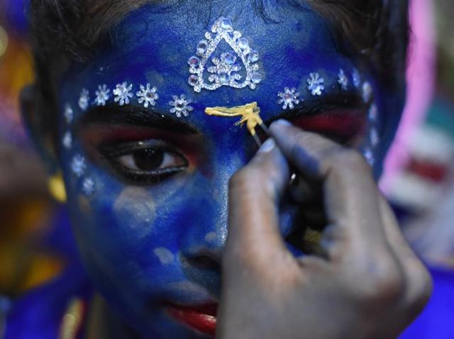 A college student dressed as Lord Krishna during a cultural event in the run up to the ‘Dahi-Handi’ (curd pot) ritual of the Janmashtami festival, at SNDT College, Matunga, Mumbai.  (Kunal Patil/HT PHOTO) 