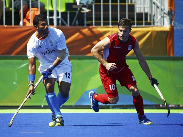 India's Akashdeep Singh (2nd L) celebrates scoring a goal with his teammates. (AFP Photo) India's Akashdeep Singh (2nd L) celebrates scoring a goal with his teammates. (AFP Photo)