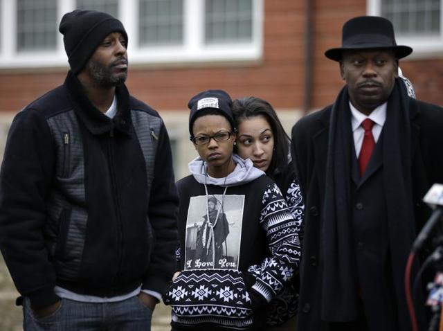 A woman wears a shirt with a photograph of Jerame Reid on it, as she listens during a news conference, in Bridgeton, New Jersey. (AP File Photo) A woman wears a shirt with a photograph of Jerame Reid on it, as she listens during a news conference, in Bridgeton, New Jersey. (AP File Photo)