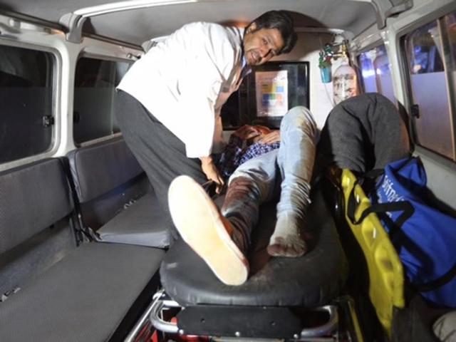 A wounded person is treated in an ambulance after an attack on the campus of the American University in the Afghan capital Kabul. (AP Photo) A wounded person is treated in an ambulance after an attack on the campus of the American University in the Afghan capital Kabul. (AP Photo)