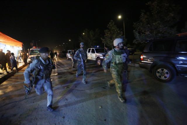 Afghan security forces rush to respond to an attack on the campus of the American University in the Afghan capital Kabul on Wednesday. (AP Photo) Afghan security forces rush to respond to an attack on the campus of the American University in the Afghan capital Kabul on Wednesday. (AP Photo)