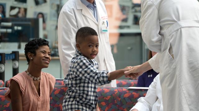 Zion Harvey, who received a double hand transplant in July 2015, shakes hands with a health care worker as his mother Pattie Ray smiles during a news conference at The Children's Hospital of Philadelphia. (AP Photo) Zion Harvey, who received a double hand transplant in July 2015, shakes hands with a health care worker as his mother Pattie Ray smiles during a news conference at The Children's Hospital of Philadelphia. (AP Photo)