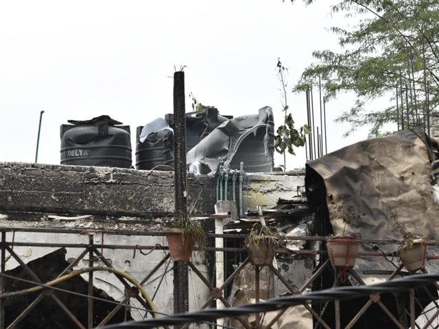 New Delhi: The Hauz Khas apartment where a fire broke out early on Wednesday morning.The fire officials said a short-circuit might have triggered the fire. (Saumya Khandelwal/HT Photo) New Delhi: The Hauz Khas apartment where a fire broke out early on Wednesday morning.The fire officials said a short-circuit might have triggered the fire. (Saumya Khandelwal/HT Photo)