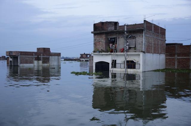 Flooded houses in Allahabad. (AP) Flooded houses in Allahabad. (AP)