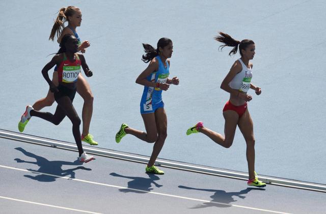 Although she didn’t finish on the podium, Lalita Shivaji Babar (in blue) gave a good account of herself in the 3000m Steeplechase final, setting a national record in the process. (PTI)