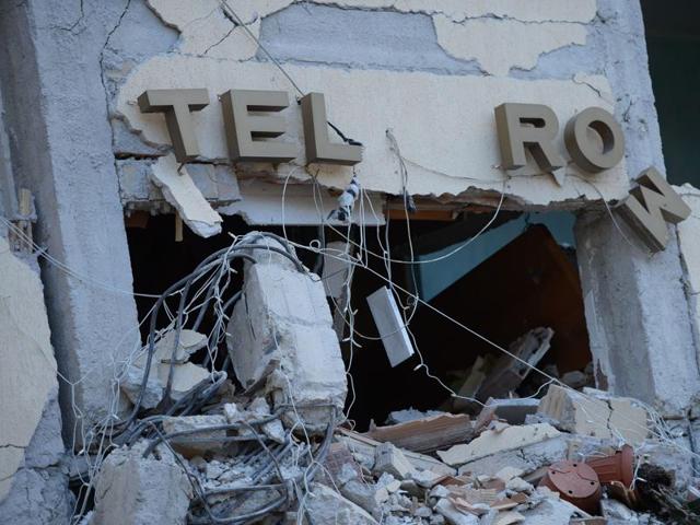 A damaged house is seen after a strong earthquake hit Amatrice, Italy. (AFP Photo)